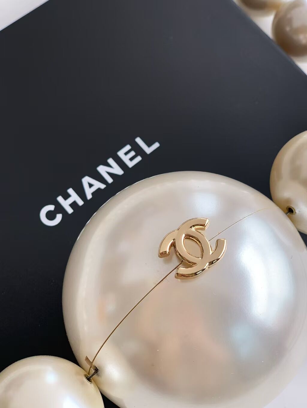 Ch@nel pearl ball bag