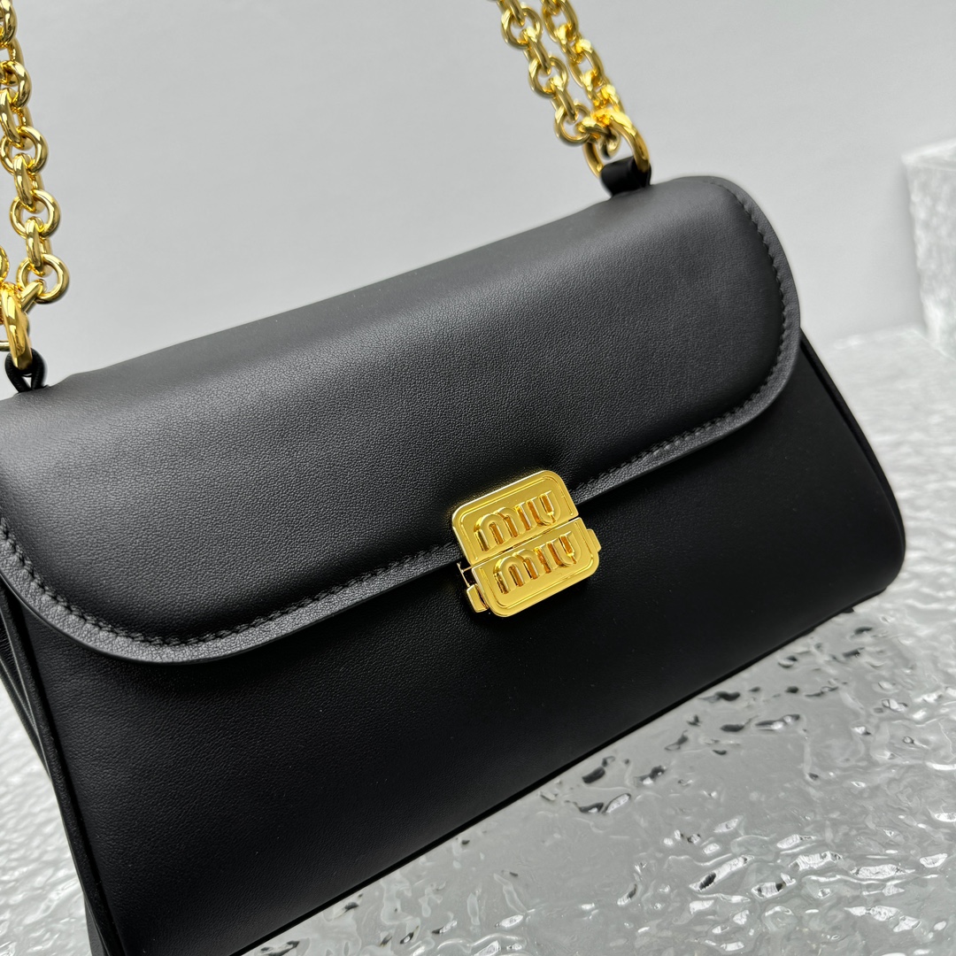 M*um*u leather shoulder bag -25*8*15cm