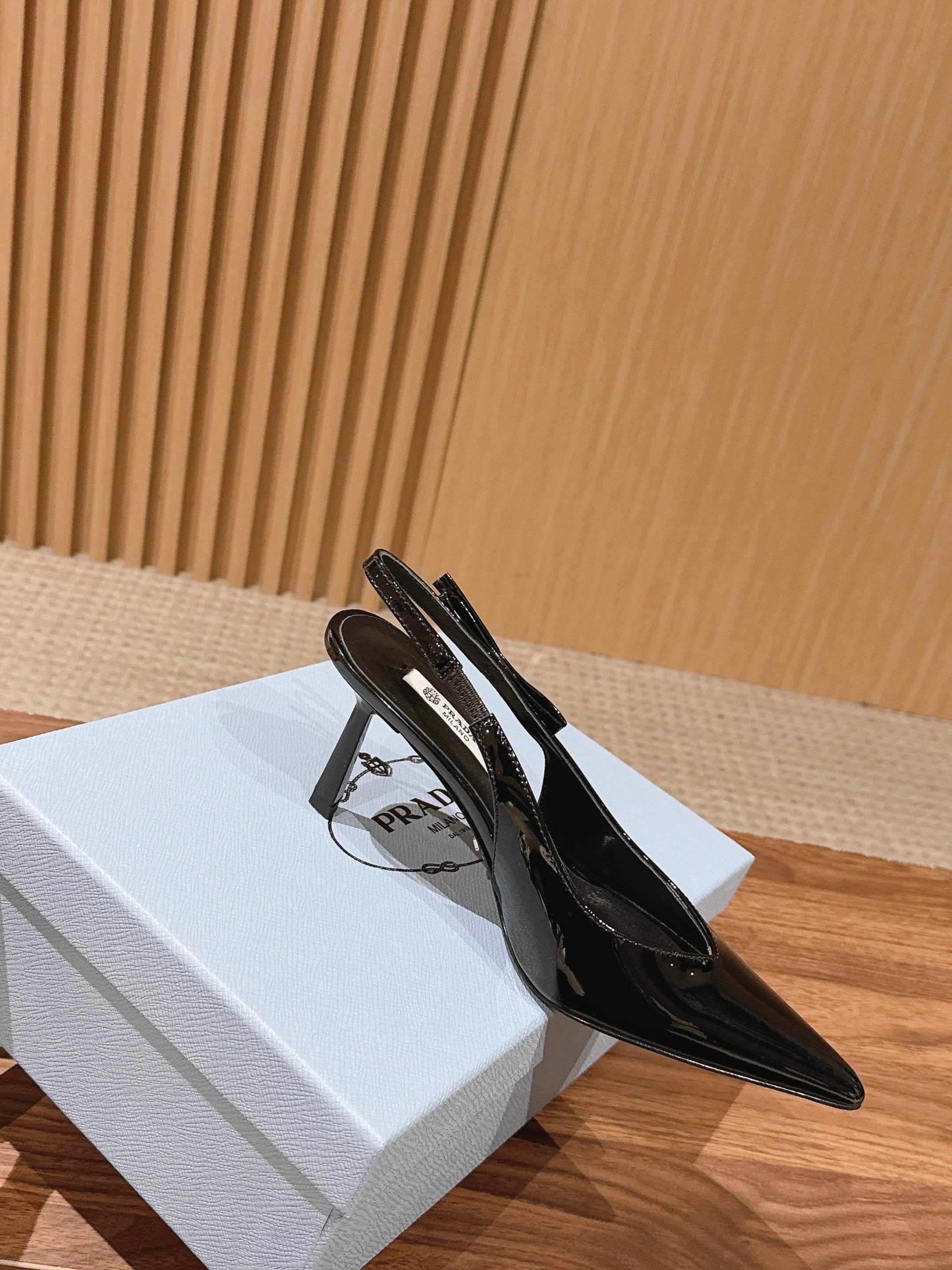 Pra*a Black Patent Leather Slingback Pumps
